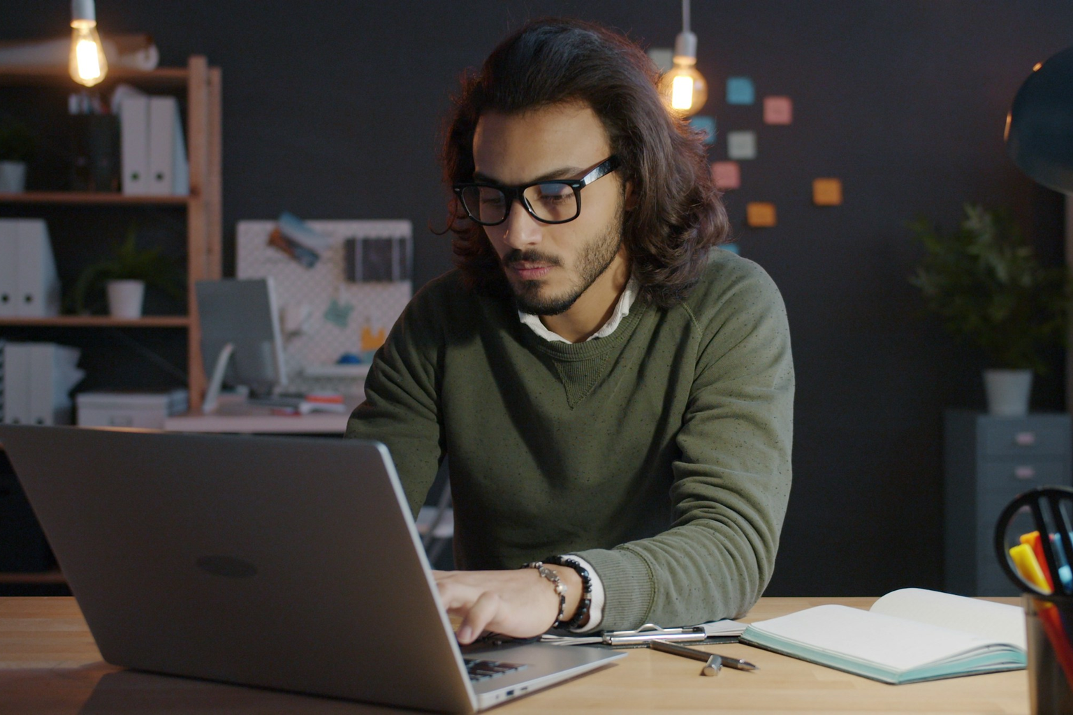Cebridge Digital engineer building at a dual-monitor workstation